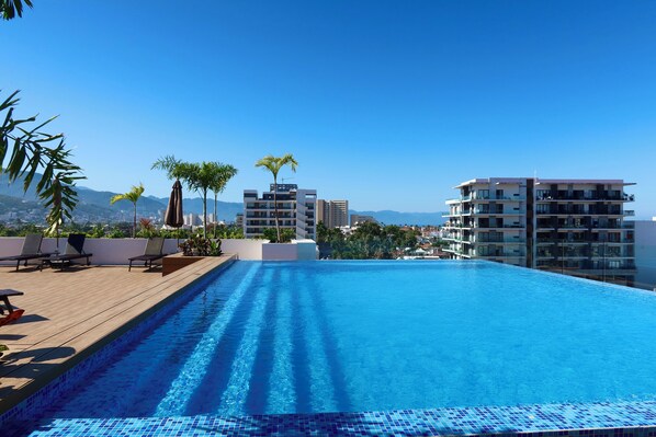 Outdoor pool, a heated pool - Cozy Apartment - Perfect for Both Short and Long-term Stays (Puerto Vallarta)