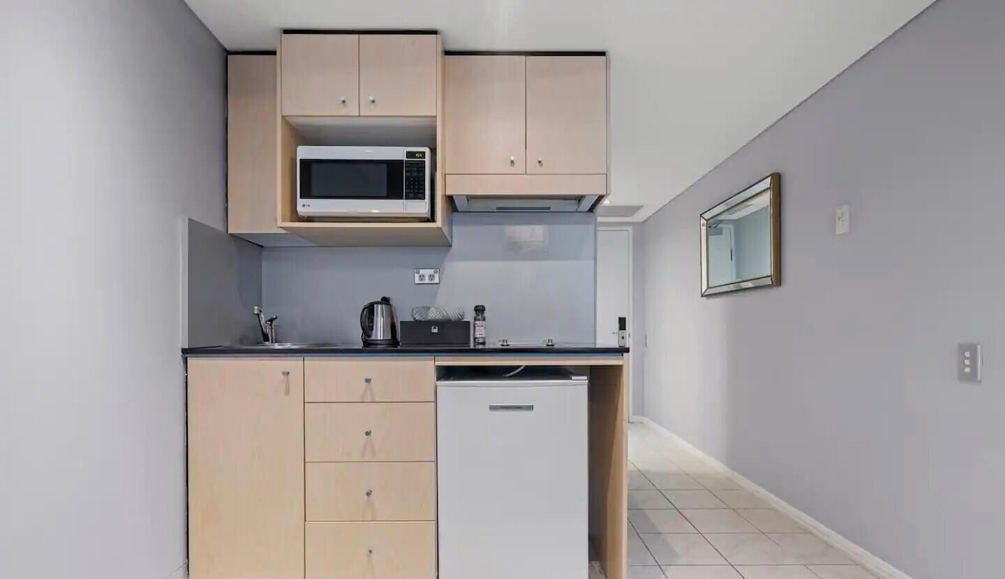 Fridge, toaster, cookware/dishes/utensils