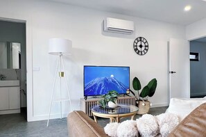 Living area - KozyGuru | Richmond | Cozy Unit and Parking near CBD (Cremorne)
