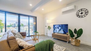 Living area - KozyGuru | Richmond | Cozy Unit and Parking near CBD (Cremorne)
