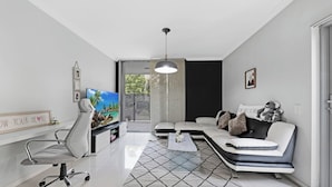 TV - KozyGuru | Ryde | Cosy 2Bed Apt with Private Yard (Ryde)