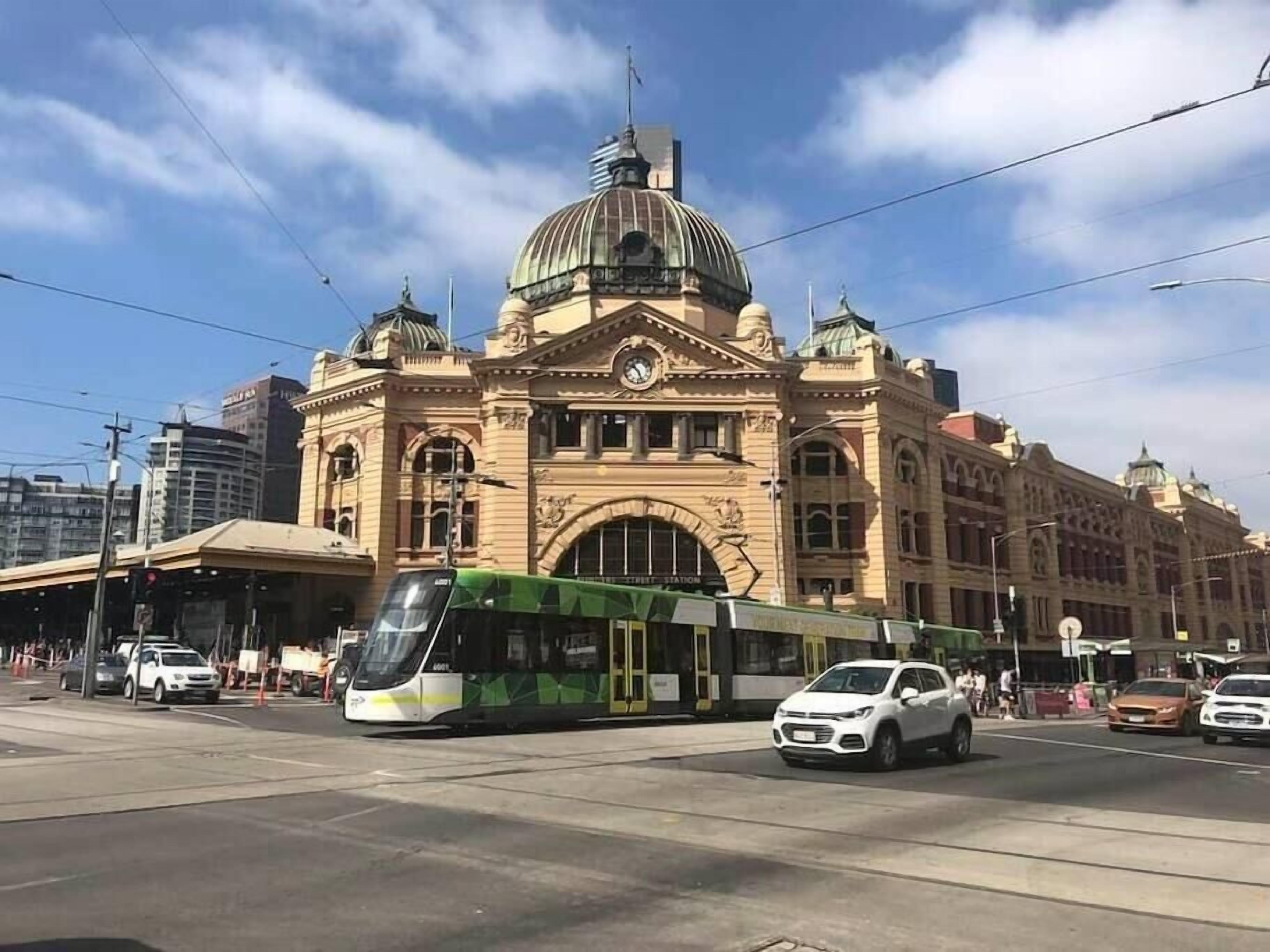 A historic building with a large dome and arched windows.