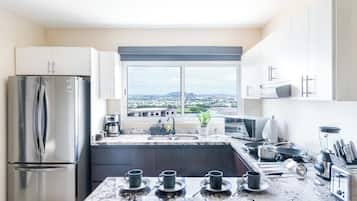 Fridge, microwave, stovetop, coffee/tea maker