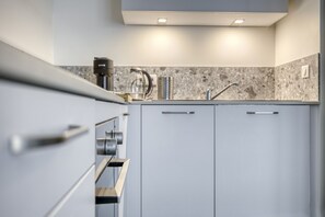 Fridge, oven, dishwasher, coffee/tea maker