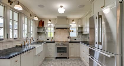 Victorian farmhouse with wraparound porch