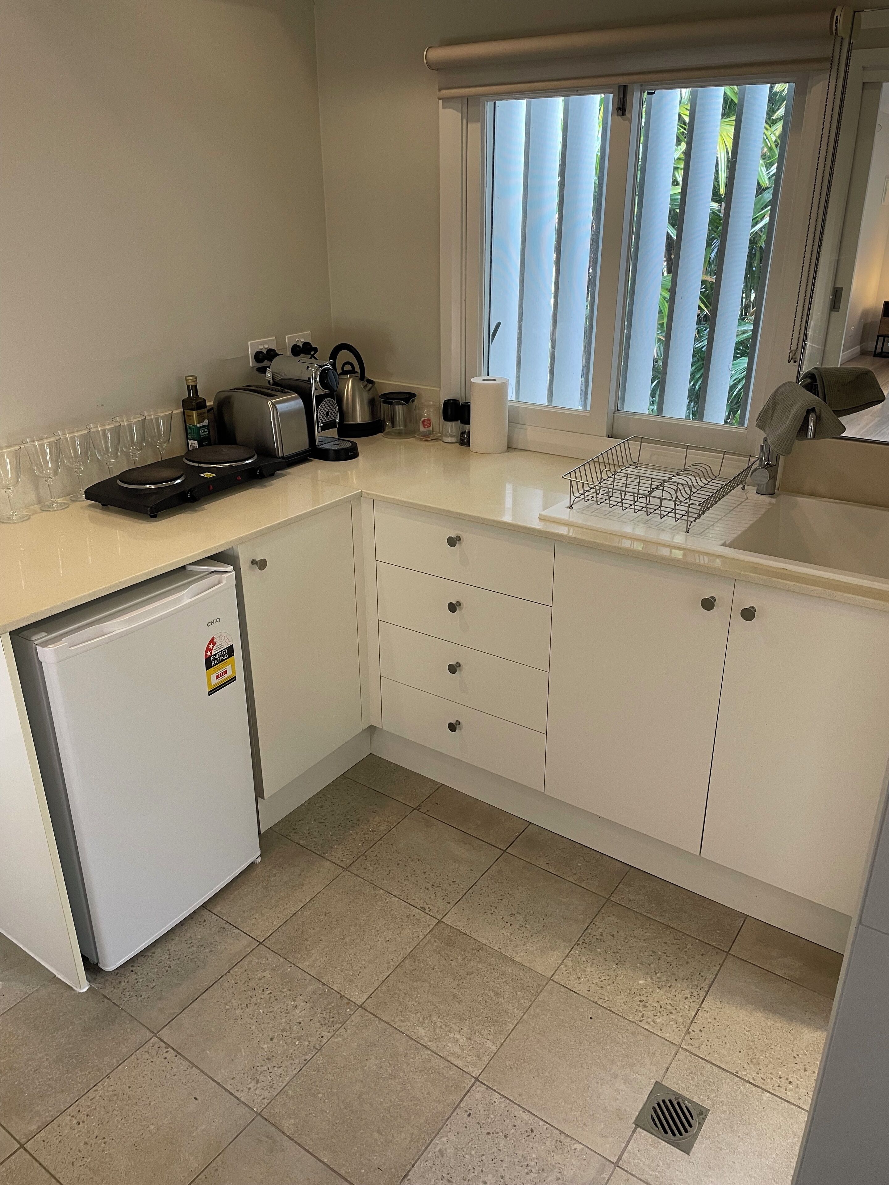 Fridge, microwave, coffee/tea maker, toaster