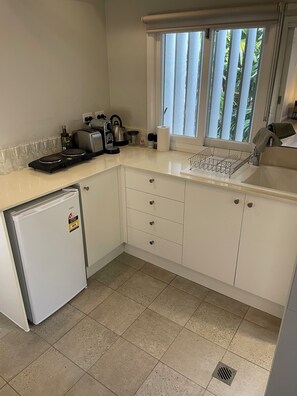 Fridge, microwave, coffee/tea maker, toaster