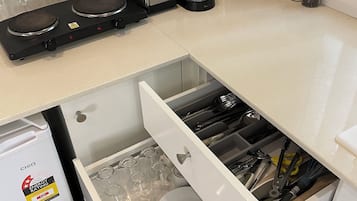 Fridge, microwave, coffee/tea maker, toaster