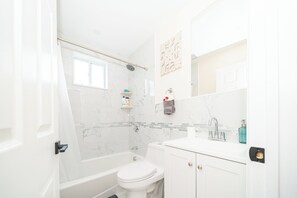 Hair dryer, towels, soap, shampoo