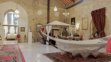 House, Garden View | Living area | Flat-screen TV