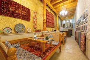 32-inch flat-screen TV with satellite channels, heated floors