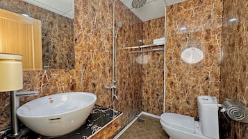 Superior Studio | Bathroom | Shower, hair dryer, slippers, towels