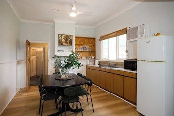Enjoy the convenience of a well-equipped kitchen and dining area, perfect for preparing meals and gathering with loved ones.