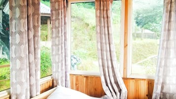 Deluxe Cottage, Balcony | 1 bedroom, desk, laptop workspace, free WiFi