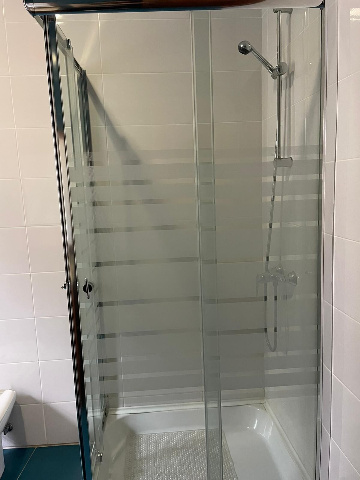 Separate tub and shower, hair dryer, towels, soap