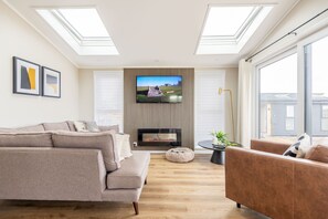 Fernseher, Kamin