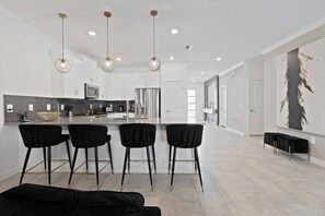 Fridge, microwave, oven, dishwasher - New Home Luxury 8 Bedrooms/5 Baths At Storey Lake (Kissimmee)