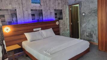 Deluxe Double Room, Private Bathroom | In-room safe, individually decorated, individually furnished, desk