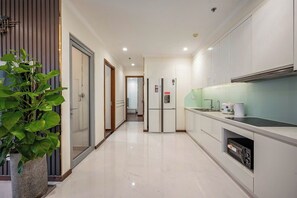 Apartment, 2 Bedrooms, Balcony, City View | Private kitchen | Full-size fridge, microwave, oven, stovetop - Cityhome Apartment Vinhomes Central Park (Ho Chi Minh City)