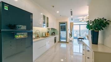 Apartment, 2 Bedrooms, Balcony, City View | Private kitchen | Full-size fridge, microwave, oven, stovetop
