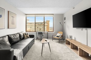 Comfort Apartment, 1 Bedroom, City View | Living area | 50-inch plasma TV with cable channels - Work + Rest in DC Apartments (Arlington)
