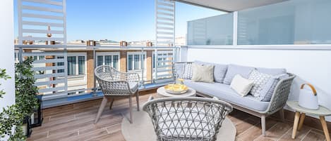 Luxury Apartment, City View | Living area | 5-inch TV with satellite channels