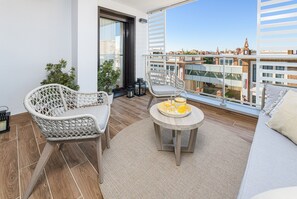 Luxury Apartment, City View | Living area | 5-inch TV with satellite channels