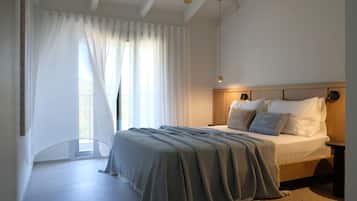 Deluxe-Apartment, 3 Schlafzimmer, Küche, Meerblick | 1 Schlafzimmer, Bettwäsche aus ägyptischer Baumwolle