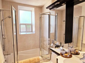 Hair dryer, towels, soap, shampoo