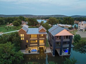 Exterior - New modern lakefront property, featuring a private cocktail pool and boat slip. (Kingsland)