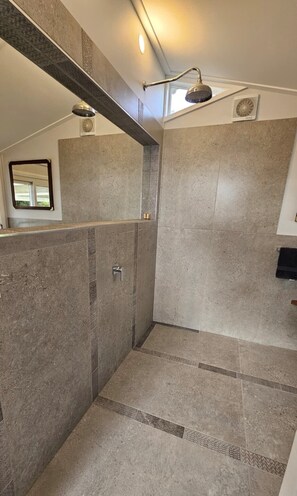 Shower, hair dryer, towels, soap