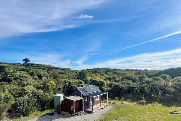 Clifftop location bordering nature reserve