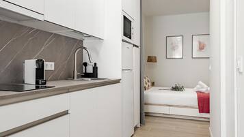 Fridge, microwave, dishwasher, coffee/tea maker