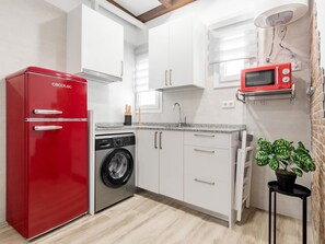 Fridge, microwave, coffee/tea maker, toaster