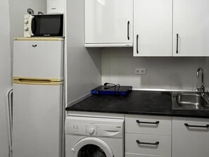 Fridge, microwave, coffee/tea maker, toaster