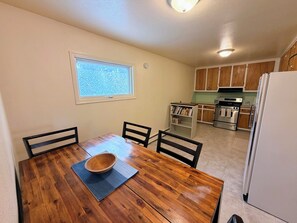 Dining - In Town 2BR: Dedicated Workspace, Free Wifi, Full Kitchen, and Laundry Access. (Fairbanks)