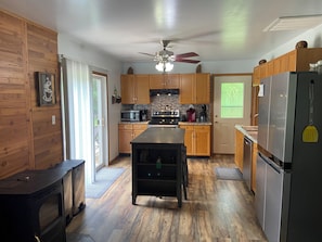 Fridge, microwave, oven, stovetop - Squatch Mountain is a 2-bedroom Cabin for all your "UPNORTH" Fun!  Dog Friendly  (Mountain)