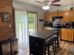 Fridge, microwave, oven, stovetop - Squatch Mountain is a 2-bedroom Cabin for all your "UPNORTH" Fun!  Dog Friendly  (Mountain)