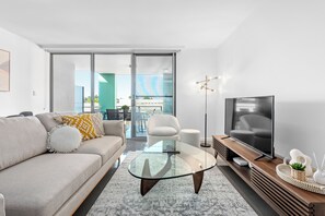 42-inch flat-screen TV with cable channels - Cirque Apartments (New Farm)