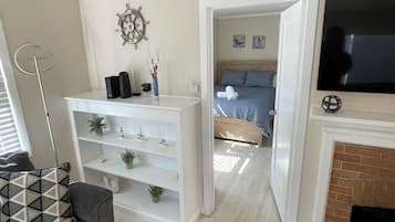 2 bedrooms, desk, iron/ironing board, travel crib