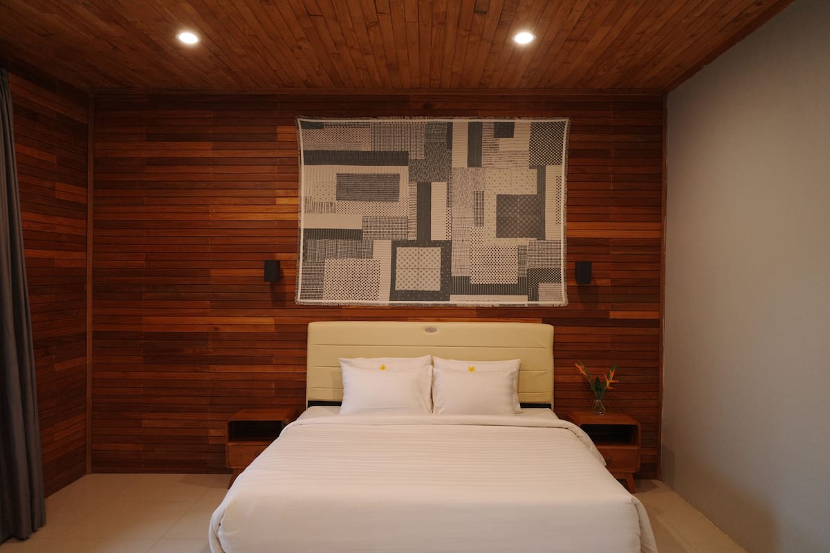 Villa estándar, vista al jardín | 1 habitación, ropa de cama de alta calidad, minibar y escritorio