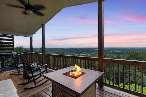 Sunset firepit and rocking chairs above the valley