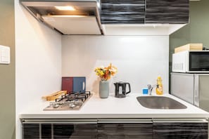Comfort Quadruple Room | Private kitchenette