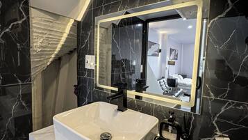 Hair dryer, bidet, towels, soap