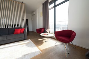 Apartamento panorâmico | Ferros/tábuas de passar roupa, Wi-Fi de cortesia, roupa de cama