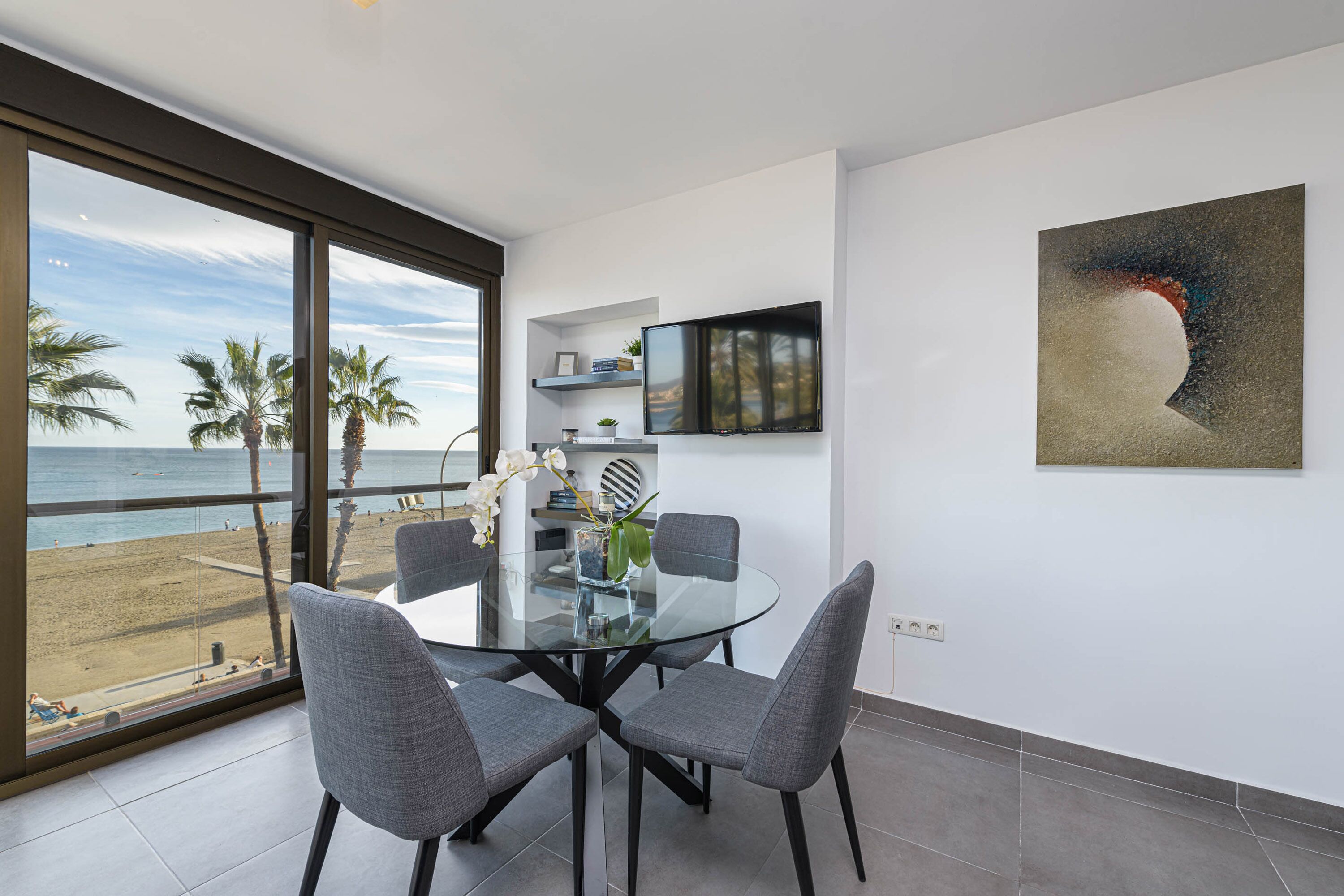 Luxury Apartment, Sea View | Living area | 50-inch TV with cable channels
