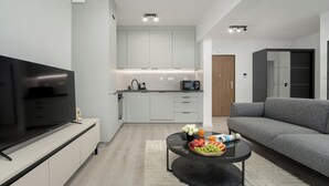 Apartamento, 1 quarto, sacada | Sala de estar