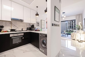 Fridge, microwave, dishwasher, coffee/tea maker