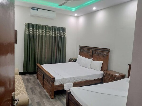 Kamar Triple Deluks | Setrika/meja setrika dan Wi-Fi gratis