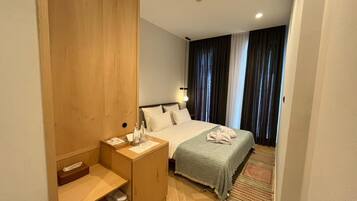 Standard Double Room, City View | In-room safe, desk, laptop workspace, blackout drapes